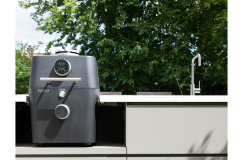 Complete outdoor kitchen in an exclusive landscape garden