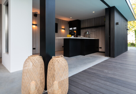 Exclusive outdoor kitchen with a bar and Big Green Egg