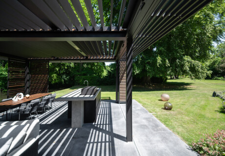 Outdoor kitchen with gas barbecue on rooftop terrace